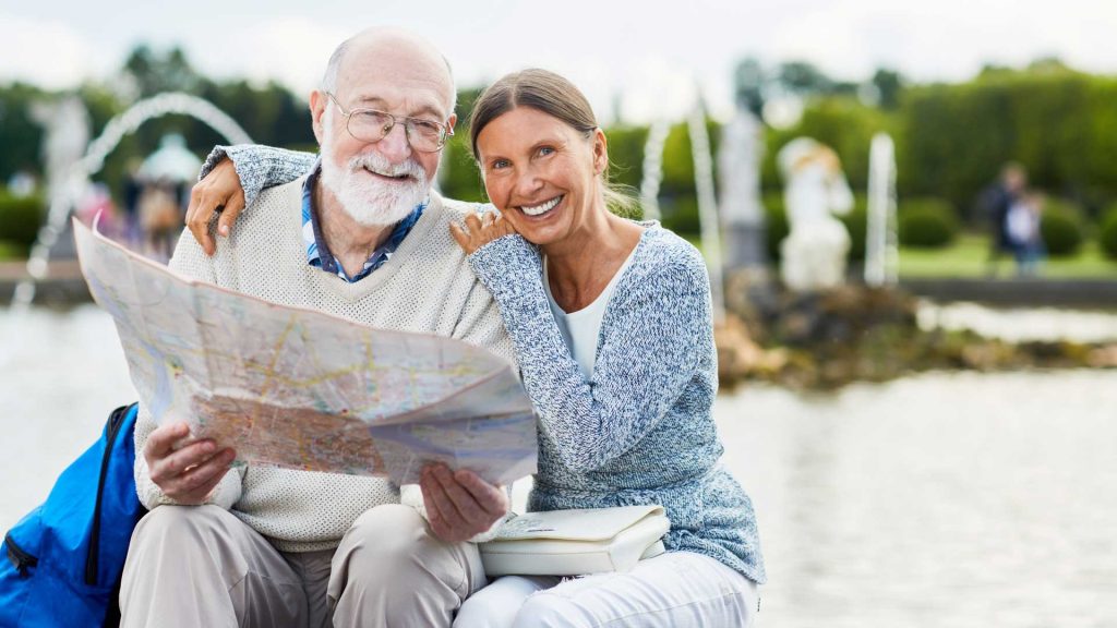 Seniors reading a map.